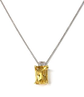 An 18ct gold citrine and diamond pendant,