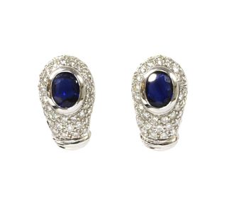 A pair of white gold sapphire and diamond earrings,
