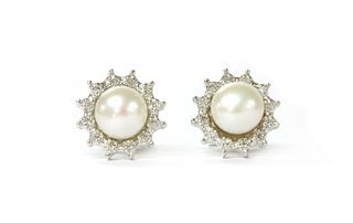 A pair of 18ct white gold cultured freshwater pearl and diamond cluster earrings,