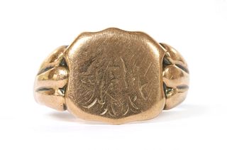 A 9ct gold shield shaped signet ring,