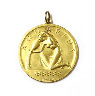 A 9ct gold zodiac Aquarius medallion, by Paul Vincze,