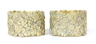A pair of silver gilt napkin rings, by Stuart Devlin,