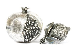 Two silver models of fruit,