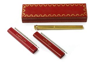 A gold plated Must de Cartier ballpoint pen,