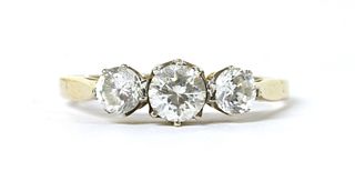 A gold three stone cubic zirconia ring,