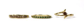 A 9ct gold treated green diamond half eternity ring,