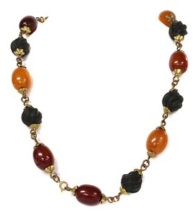 A gilt metal Bakelite bead necklace,