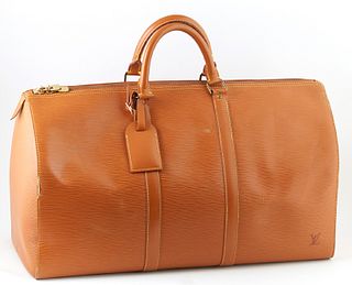 Louis Vuitton Keepall Brown Epi Calf Leather 50 Travel Bag, with golden brass hardware, opening to a brown suede interior, the exterior with an open s