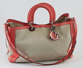 Dior Beige Canvas and Pink Leather 2 Way Shopping Tote, with silver hardware and Dior charm hanging on exterior, the magnetic clasp opening to a large