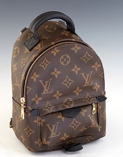 Louis Vuitton Palm Springs Mini Backpack, in brown monogram coated canvas with black leather accents and golden hardware, opening to a black canvas li