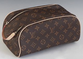 Louis Vuitton King-Size Toiletry Bag, in brown monogram coated canvas with vachetta leather accents and golden brass hardware, opening to a brown calf