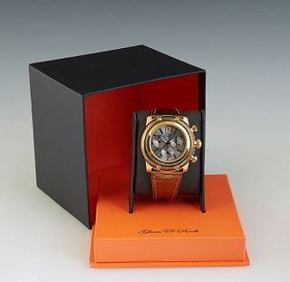Glam Rock Man's Chronograph, 20th c., in original box, with a gold leather band.