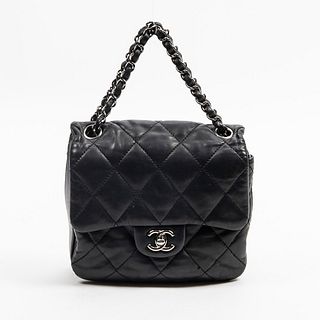 Chanel Three Accordion Mini Flap Shoulder Bag, c. 2010, in black quilted calf leather with metal brass hardware, opening to a black silk lined interio