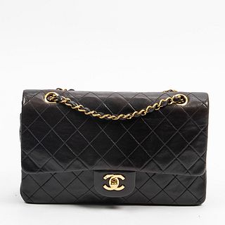 Chanel Classic Double Flap 26 Shoulder Bag, c. 1994, in black quilted calf leather with golden hardware, opening to burgundy calf leather lined interi