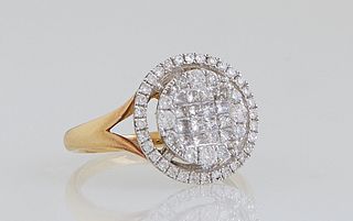 Lady's 14K Yellow Gold Dinner Ring, the circular top with round and princess cut diamonds, within a pierced outer border of tiny round diamonds, on a 