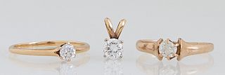 Three Pieces of Vintage 14K Yellow Gold Diamond Jewelry, consisting of a solitaire ring with a 25 point round diamond, Size 5 1/2; a solitaire ring wi