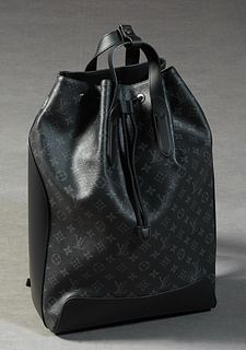 Louis Vuitton Backpack, in black monogram coated canvas with black leather accents and silver toned hardware, opening to a black canvas lined interior