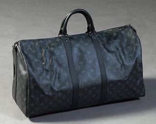 Louis Vuitton Travel Bag, in black monogram coated canvas with black leather accents and gun metal hardware, opening to a black canvas lined interior 