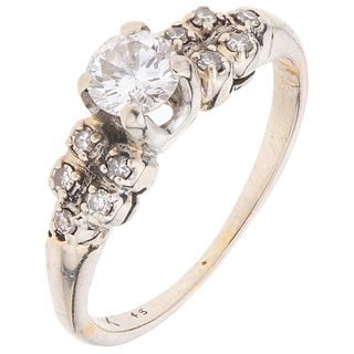 RING WITH DIAMONDS IN 10K WHITE GOLD 1 Brilliant cut diamond ~0.37 ct Clarity: I1-I2. Weight: 2.8 g. Size: 5 ¾ | ANILLO CON DIAMANTES EN ORO BLANCO DE