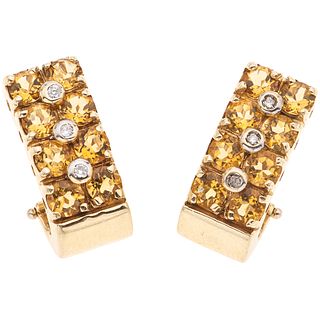 PAIR OF EARRINGS WITH CITRINES AND DIAMONDS IN 14K YELLOW GOLD Round cut citrines ~3.50 ct, Brilliant cut diamonds ~0.06 ct | PAR DE ARETES CON CITRIN