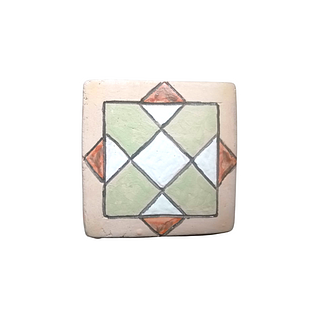 Geometric design of white, green and burnt orange tile. 345 pieces. They can be purchased in groups of ten. 