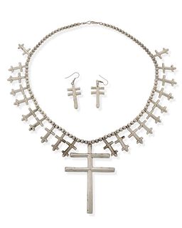 An Isleta Pueblo cross necklace and earrings
