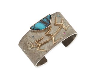 An Andrew Redhorse Alvarez silver and gold cuff bracelet