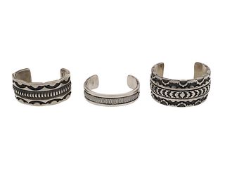 Three Southwest silver cuff bracelets