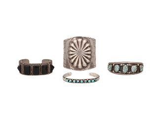 Four Native American cuff bracelets