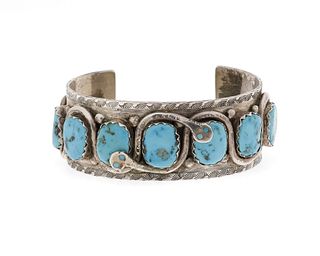 An Effie Calavaza Zuni turquoise and silver cuff bracelet