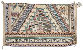 A Navajo regional raised outline blanket, by Lena Curtis