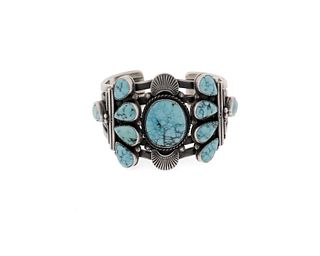 A Navajo silver and turquoise cuff bracelet