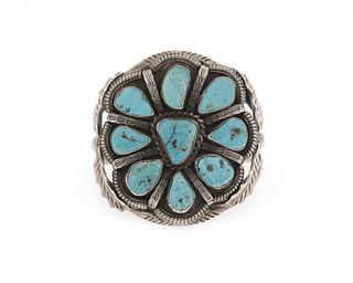 A Carl Begay Navajo silver and turquoise cluster bracelet