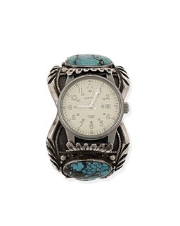 A Navajo silver and turquoise watch cuff
