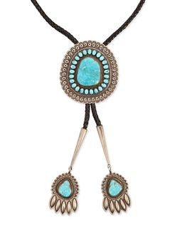 A Southwest silver and turquoise bolo tie