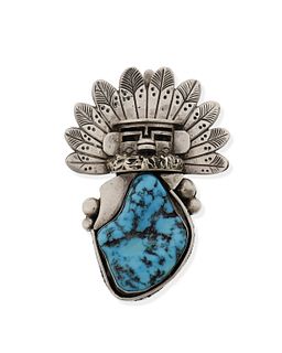 A Hopi kachina pendant with turquoise torso
