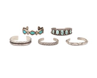 Five Southwest silver cuff bracelets