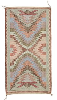 A Navajo regional raised outline rug, by Susie Yazzie