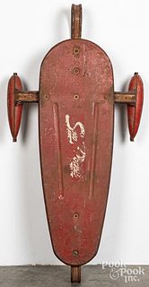 Metal Sno Rocket sled, and a Skooter Skate