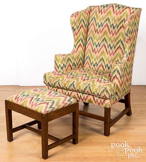Kittinger wing chair and footstool.
