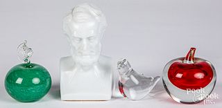 Three glass paperweights and a bust of Lincoln
