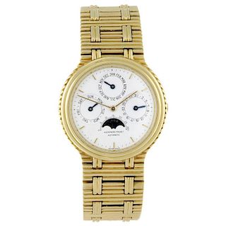 AUDEMARS PIGUET - a gentleman's QuantiÞme PerpÚtuel bracelet watch. 18ct yellow gold case. Numbered