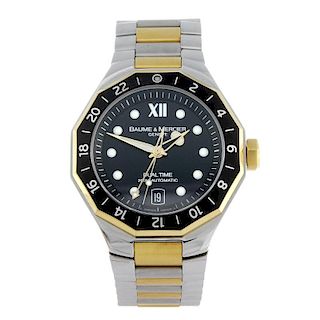 BAUME & MERCIER - a gentleman's Riviera Dual Time bracelet watch. Stainless steel case with yellow m
