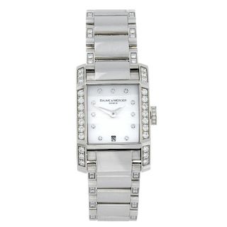 BAUME & MERCIER - a lady's Hampton bracelet watch. Factory diamond set stainless steel case. Referen