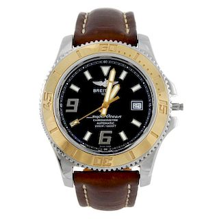 BREITLING - a gentleman's Aeromarine Superocean wrist watch. Stainless steel case with rose metal be