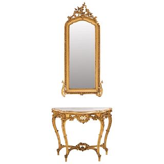 CONSOLE WITH MIRROR 20TH CENTURY Made of carved and gilded wood. It has a beveled moon Console: 36.6 x 43.3 x 17.7" (93 x 110 x 45 cm) Mirror: 70.8 x 