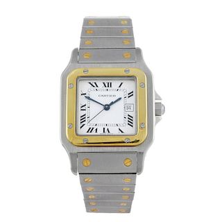 CARTIER - a Santos bracelet watch. Stainless steel case with yellow metal bezel. Numbered 1172961 11