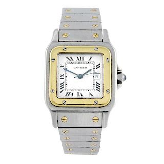 CARTIER - a Santos bracelet watch. Stainless steel case with yellow metal bezel. Numbered 2961101551