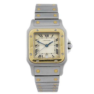 CARTIER - a Santos bracelet watch. Stainless steel case with yellow metal bezel. Numbered 187901 436
