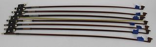 Lot Of 4 Unsigned Silver Wrapped Violin Bows .
